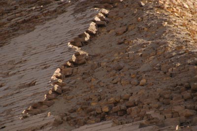 plundered casing stones on the top section