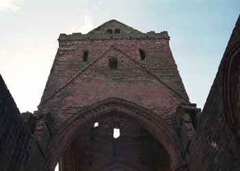 Looking up at the square tower from the altar