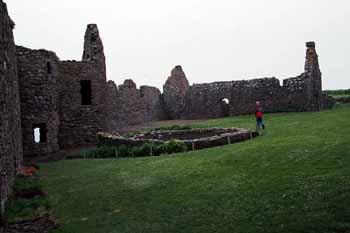 In the courtyard, near the giant cistern