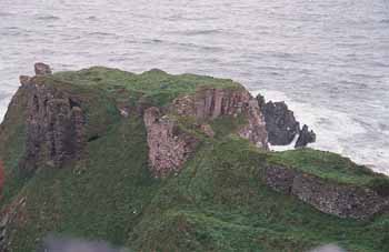 A closer view of the ruined foundations on the cliff